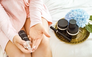 Woman holding Lavelier products on lap
