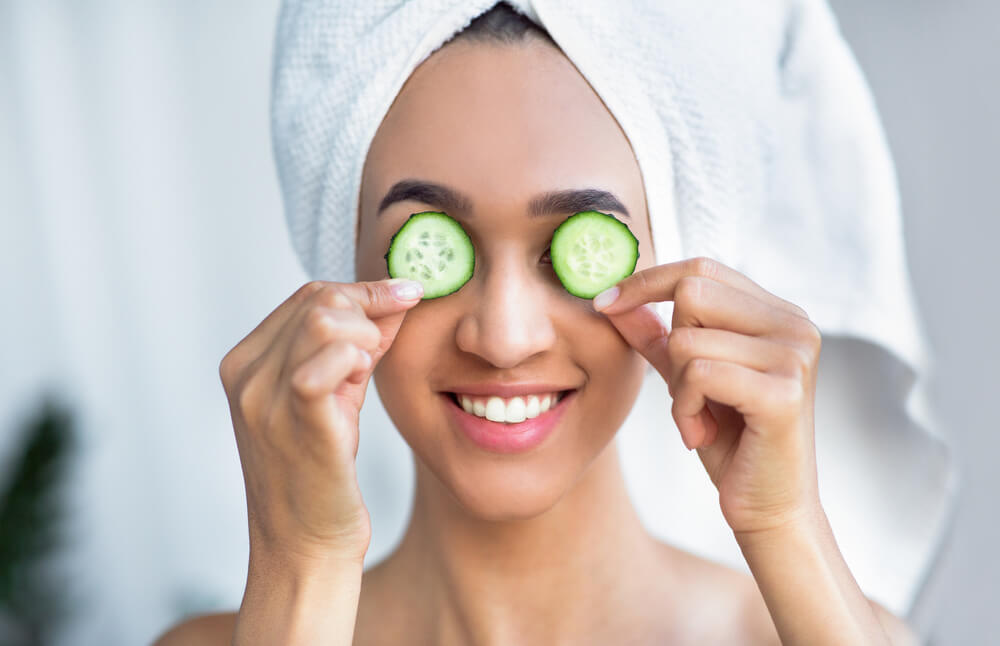 Cucumber slices on eyes