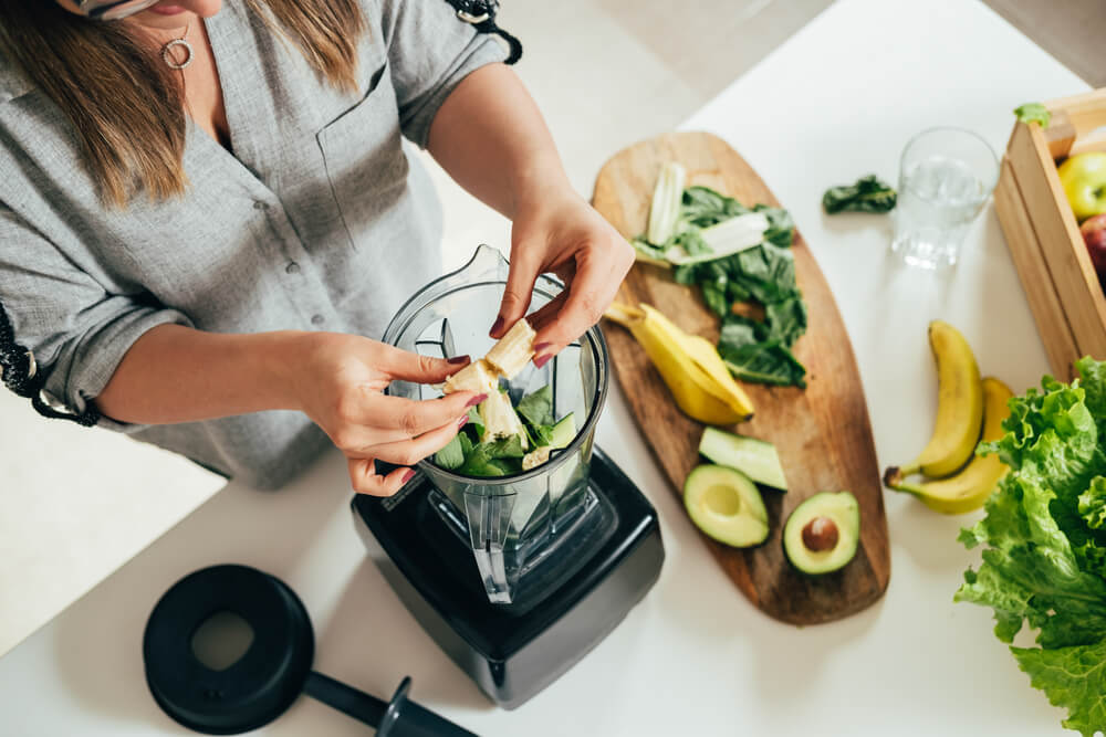 Woman making smoothie