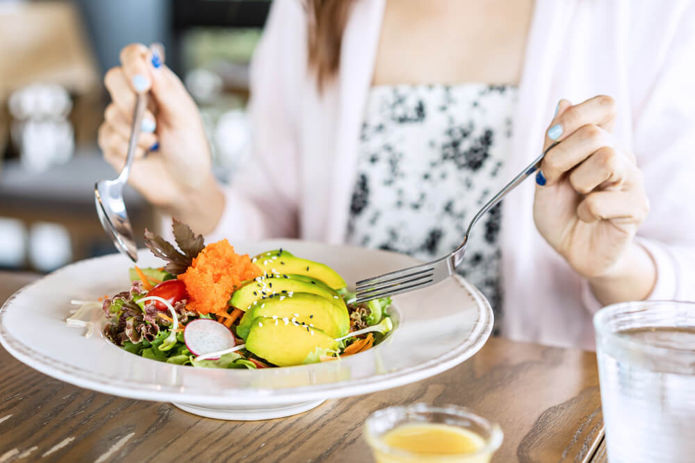 Woman eating healthy food