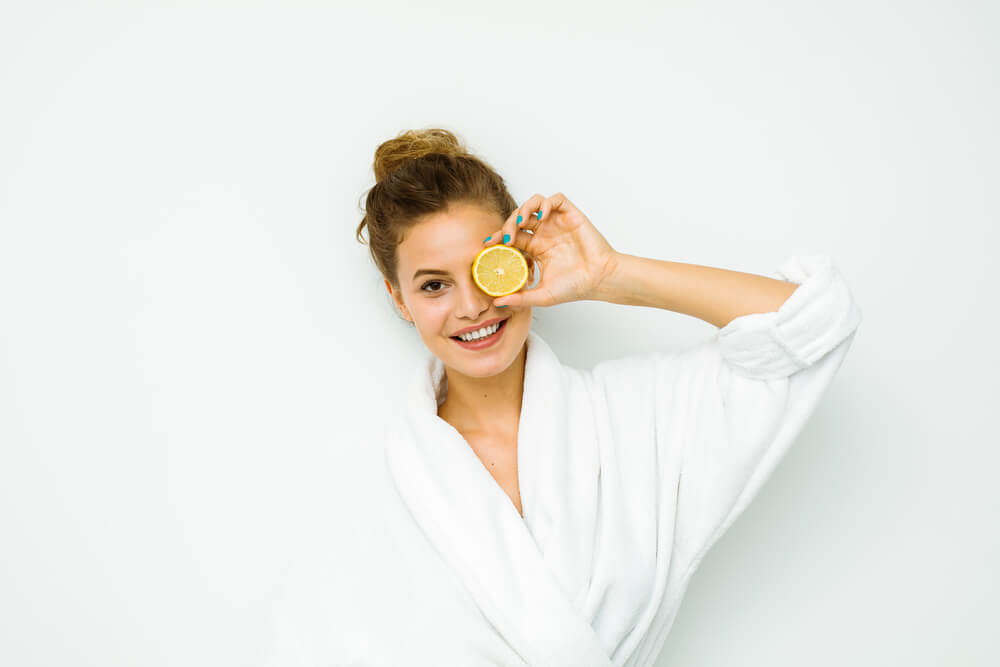 Woman holding orange