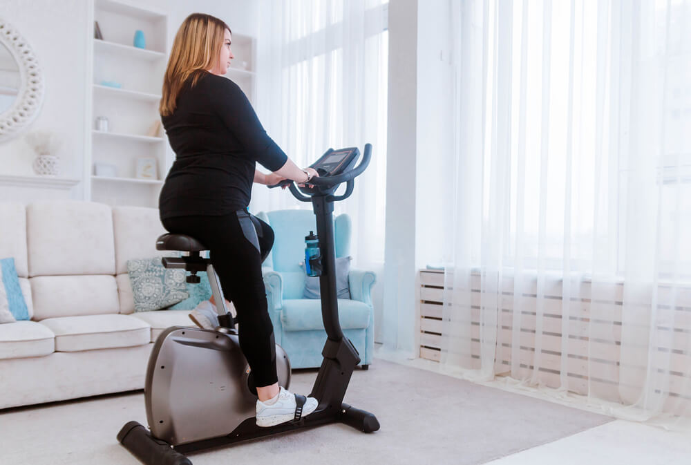 Woman on exercise bike