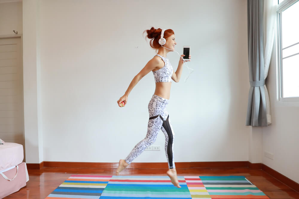 Woman exercising at home