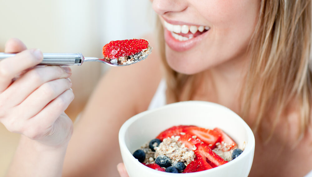 Woman eating healthy food