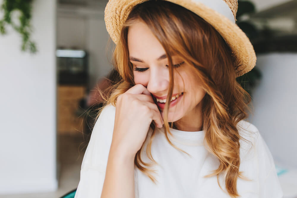 Woman touching face