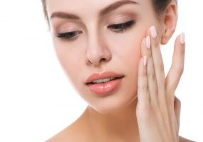 woman touching face