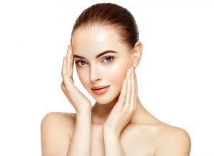 woman holding face